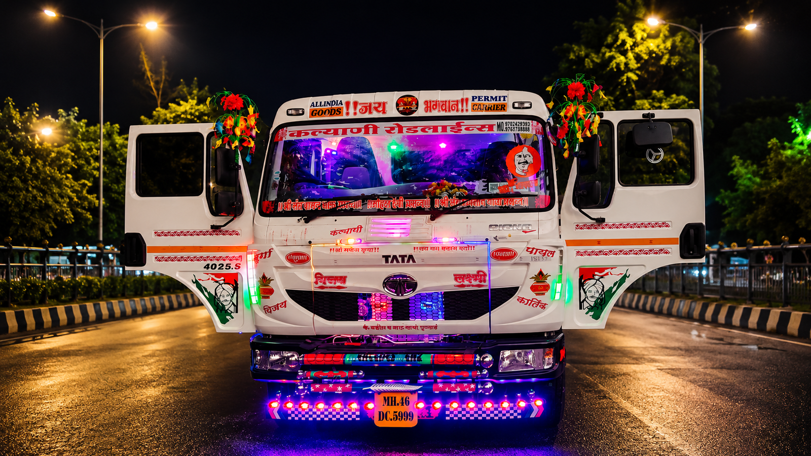 Kalyani Roadlines Tata truck at night with cabin doors open